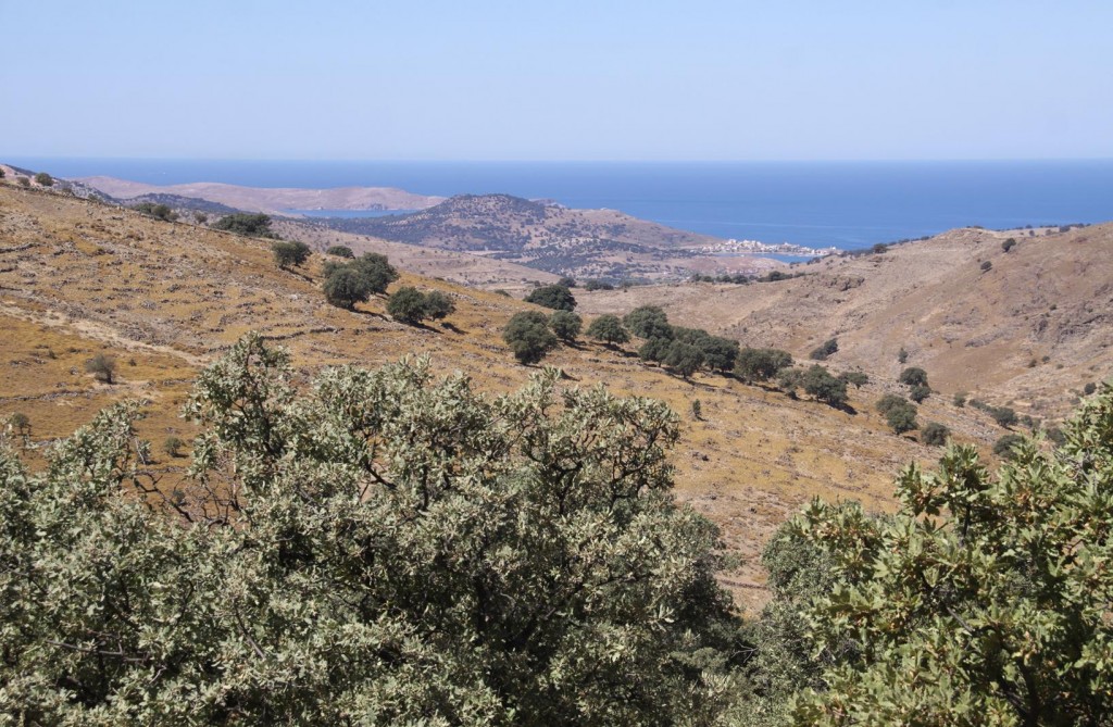 Continuing West the Port of Sigri Appears Between the Hills