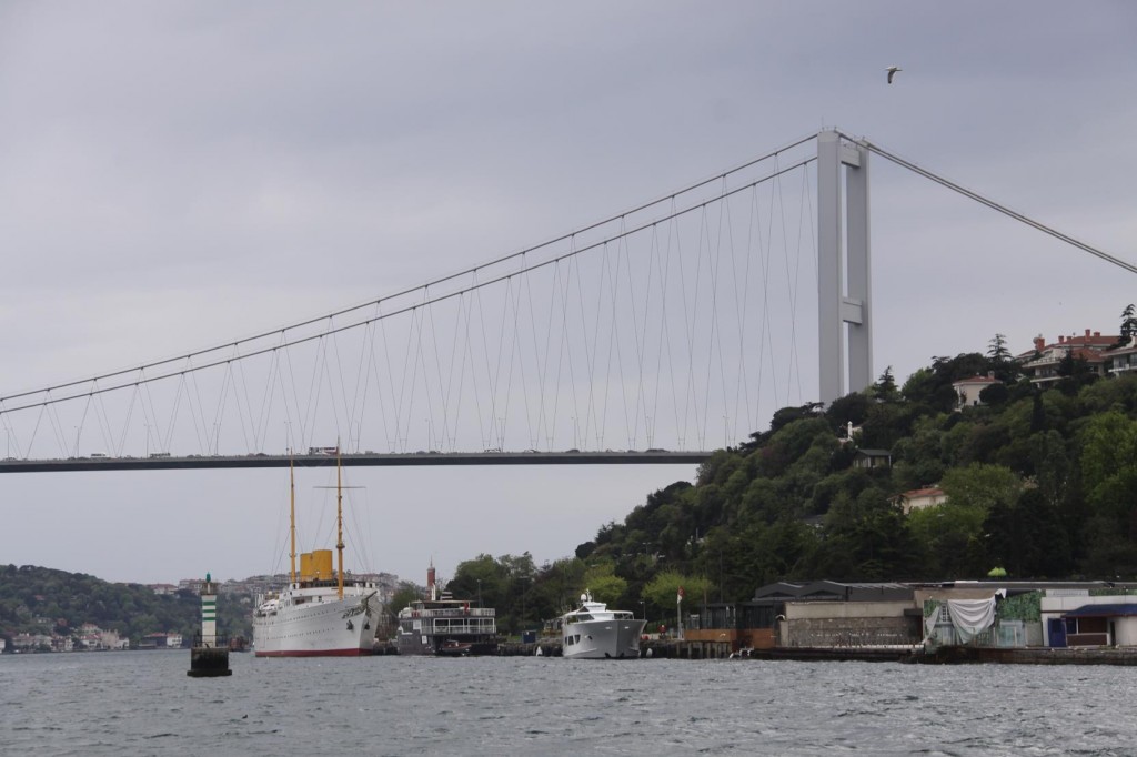The Bosphorus Bridge with Ataturk's Ship the "Savaronna" Moored Close By
