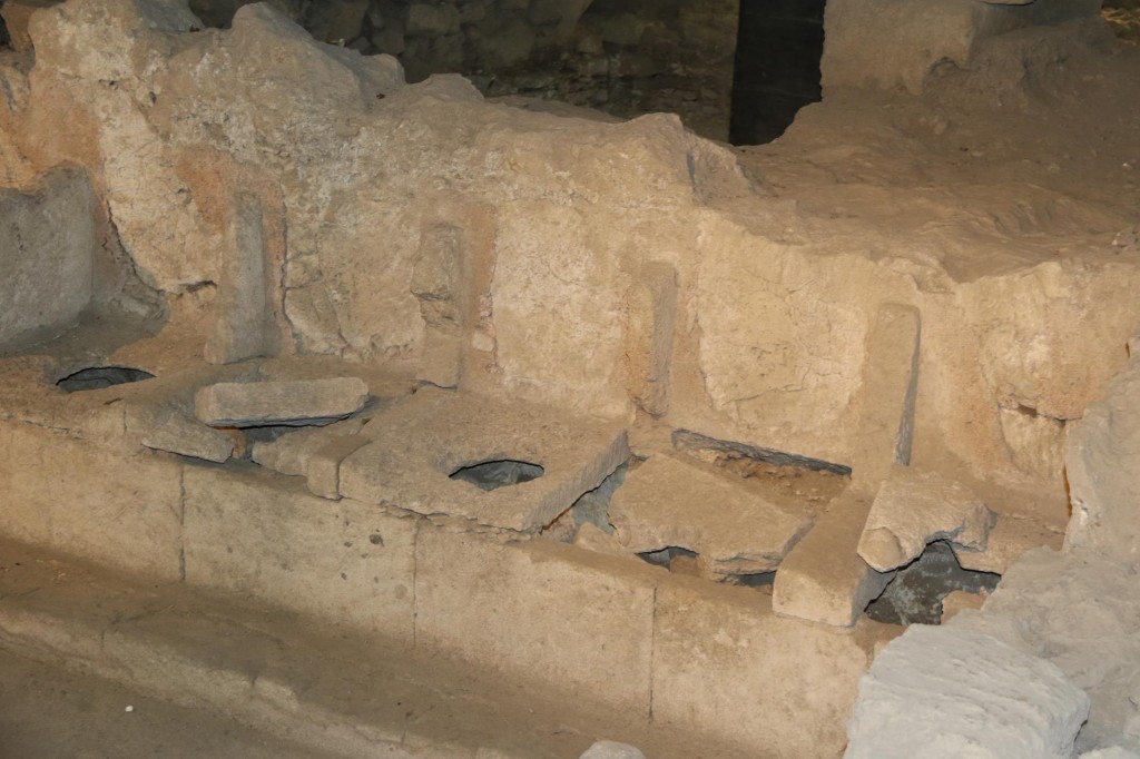 At first we thought these were ancient latrines however they actually were draining seats for corpses of priests and laymen. 