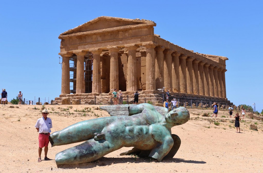 A massive bronze sculpture by sculptor Igor Mitoraj lies beneath the 5th Century BC Temple