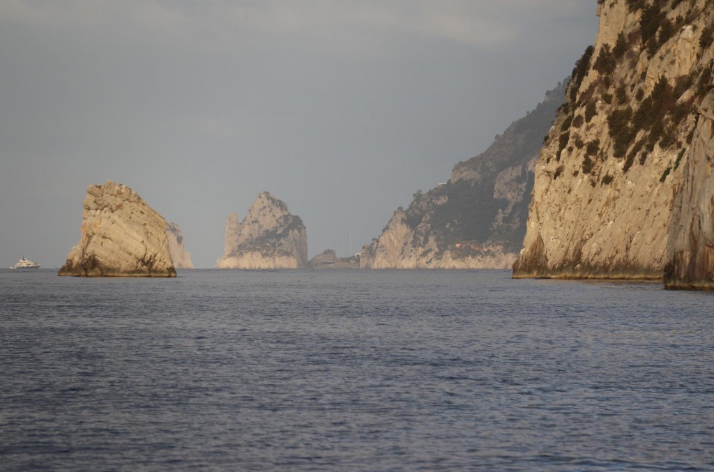 In the distance is Il Faraglioni the famous rock outcrops in south west Capri  