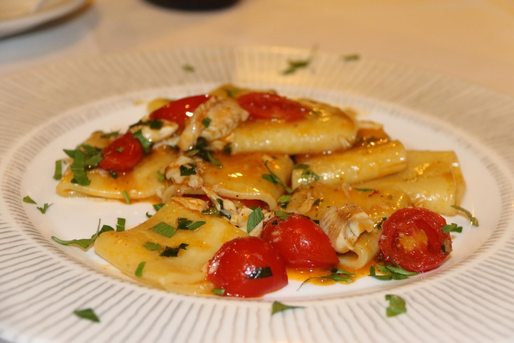 Delicious Pasta with fish, tomatoes and herbs