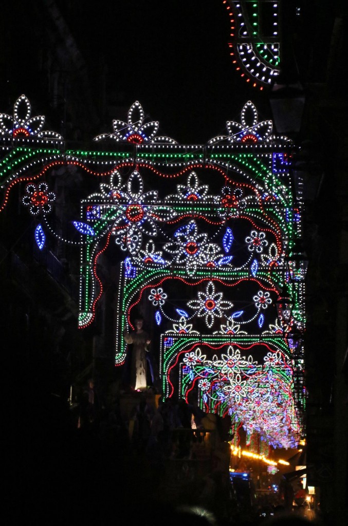 The festival lights were shining brightly in the main street