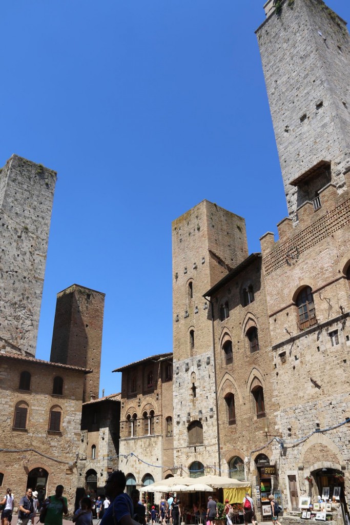 San Gimignano is an ancient walled hilltop town which is easily recognised from the distance by a number of very tall square towers
